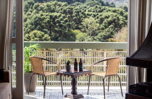 Vila Iara Apartamento | Incrível Vista no Capivari com 4 Quartos e Lareira