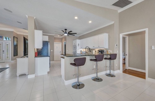 Burnt Store Isles Casa | INCREDIBLE WATER VIEW!! NEW LUXURY REMODELED HOME; HEATED SALT POOL, GOLF NEARBY