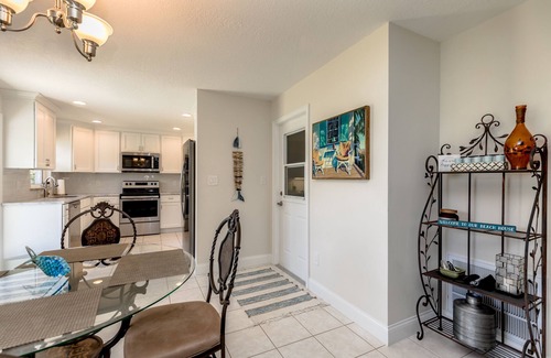 Micco Casa | Indian River Waterfront Home with private dock, heated pool, fenced back yard