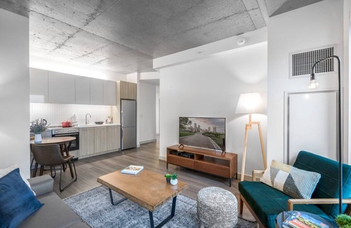 MIT Apartamento | Industrial 1BR near MIT w/ Gym, Doorman, Roof Deck