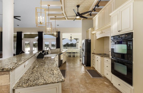 Port Charlotte Casa | Infinity Pool LARGE Home on Fishing Lake — ALL NEW —Fall Winter 25-26 Available