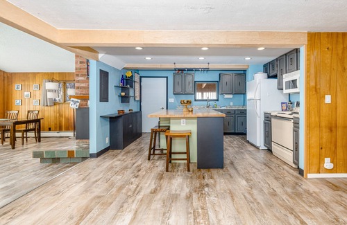 Turnagain Casa | Inviting home with fireplace, natural light, full kitchen, W/D