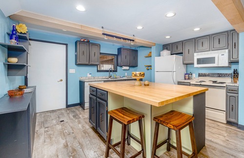 Turnagain Casa | Inviting home with fireplace, natural light, full kitchen, W/D