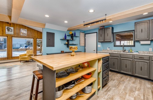 Turnagain Casa | Inviting home with fireplace, natural light, full kitchen, W/D