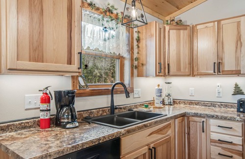 Arkdale Casa | Inviting home with game room, firepit, full kitchen, & W/D