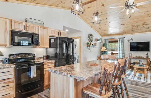 Arkdale Casa | Inviting home with game room, firepit, full kitchen, & W/D