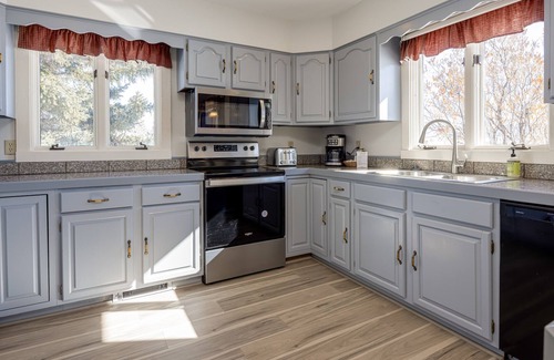 Jackson Hole Casa | Inviting home with mountain view, fireplace, golf nearby, & washer/dryer