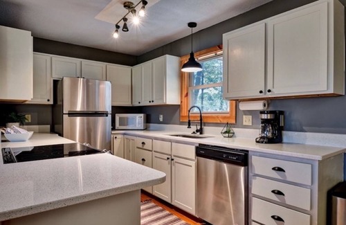 Glenville Casa | Inviting house near Lake Glenville with firepit, fireplace, grill, porch, & deck