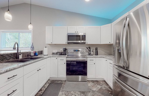 Mason County Casa | Inviting riverfront home with full kitchen, firepit, W/D, & dog-friendly
