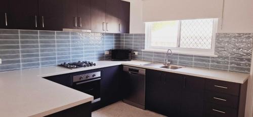 Rockingham Apartamento | Inviting Stay Close to Rockingham and Palm Beach - Hosted by Canstay