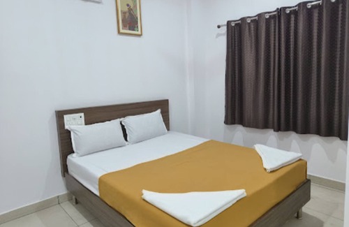 Chikkamagaluru Hotel | iROOMZ Relax Inn Lodge