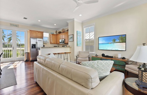 Islamorada Casa | Casa en Islamorada en Anglers Reef con vista al mar, muelle, piscina comunitaria y playa privada