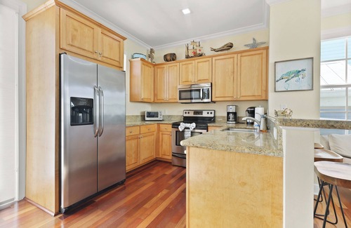 Islamorada Casa | Casa en Islamorada en Anglers Reef con vista al mar, muelle, piscina comunitaria y playa privada