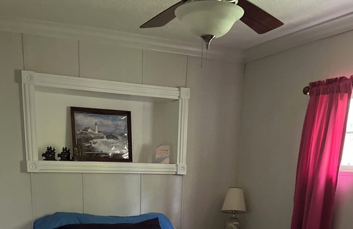 Algonac Cabaña | Island, house cottage. Lakefront property with boatlift and seawall.
