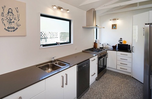 Onetangi Cabaña | Hora de la isla - Onetangi Holiday Home