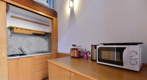 Cagliari Apartamento | IzzHome Full Center Grand