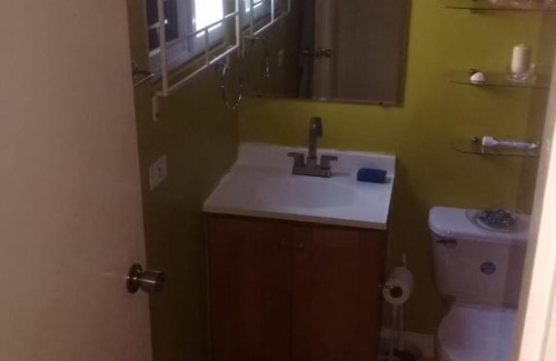 Spanish Town Apartamento | Jacaranda Cottage