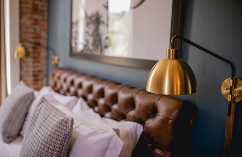 Jacksonville Hotel | Jacksonville Inn Room #8: King Suite. Prime downtown location for festivals and dining. Comfortable king bed, Nespresso coffee, and historic boutique elegance