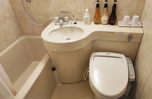 Iwanuma Hotel | Japanesestyle room with 8 tatami mats and a bath / Iwanuma Miyagi