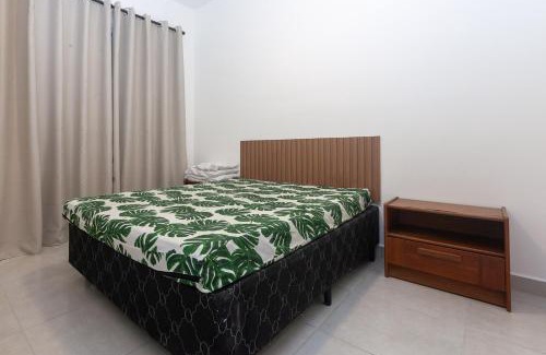 Estufa I Apartamento | Jardim das Palmeiras, piscinas, lazer, estacionamento coberto, prox. Praia Grande