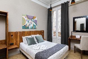 Dreta de l'Eixample Cama Y Desayuno | Jardinets Guest House