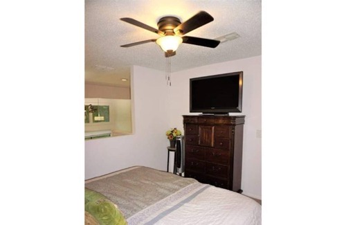 Lutz Casa | JIM MILLER 2 BDRM "ISLAND BREEZE" w/GOLFCART T-1