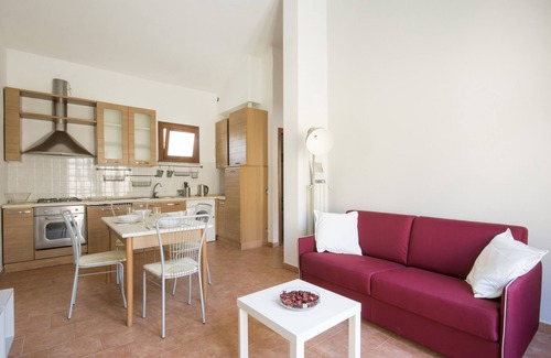 Pisa Apartamento | JOIVY Red Terraced Apartment