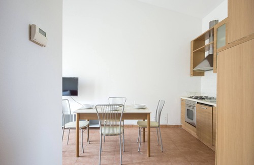 Pisa Apartamento | JOIVY Red Terraced Apartment