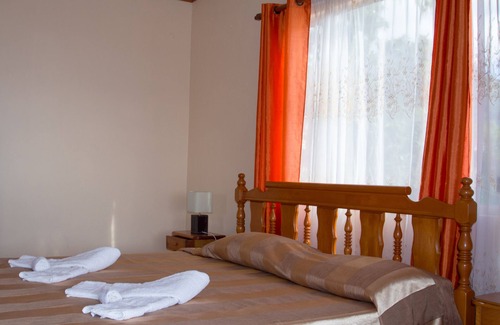 Mare Anglaise Cama Y Desayuno | Habitación doble Josies Cottage con desayuno en Beau Vallon, vista al mar