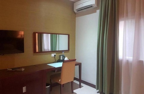 Abuja Cabina | Joy House Hotel - Solace