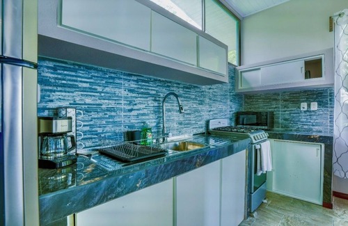Valle Pura Vida Condominio | Jungle Condo upstairs unit 2BR/1B full kitchen free parking
