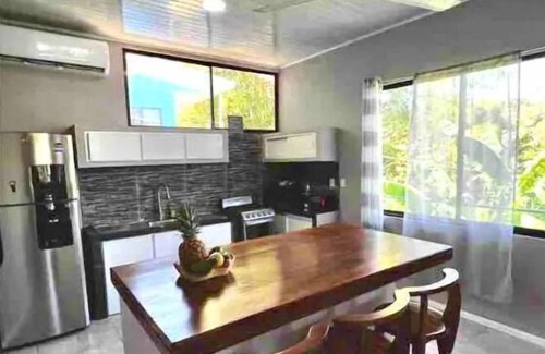 Valle Pura Vida Condominio | Jungle Condo upstairs unit 2BR/1B full kitchen free parking