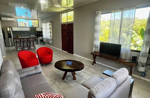 Valle Pura Vida Condominio | Jungle Condo upstairs unit 2BR/1B full kitchen free parking