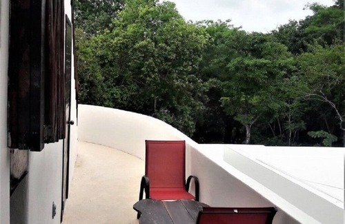 Chemuyil Apartamento | Suite privada en la jungla con cocina, habitación privada y aire acondicionado
