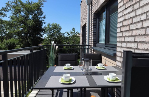 Tossens Apartamento | KÜSTE33/33 - Sauna. Balcony. Family-friendly.