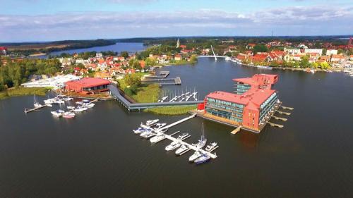 Mikolajki Cabina | Kameralny domek drewniany letniskowy w Mikolajkach
