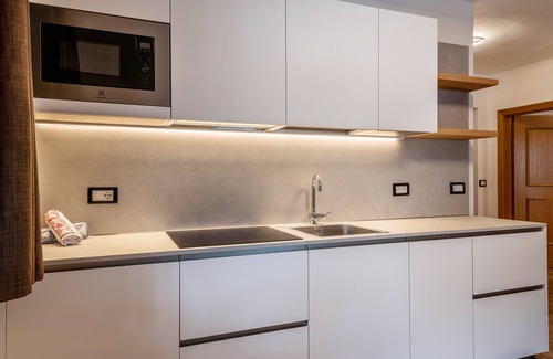 Campitello di Fassa Apartamento | Kamerloy Apartments - A con vistas a las montañas, Wi-Fi, balcón y jardín