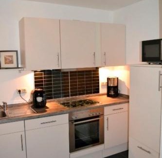 Eckernfoerde Apartamento | Kapitäns Koje mit Strandkorb
