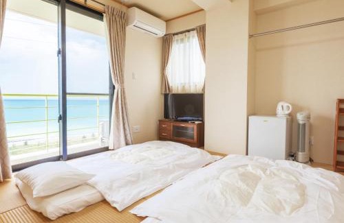 Kin Apartamento | Kariyushi Condominium Ocean Hills Chouraku Stay