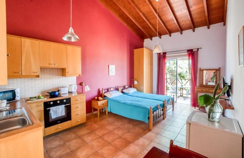 Latsi Apartamento | Kate's Latchi Beachfront Studio Apartment 105 by Ezoria