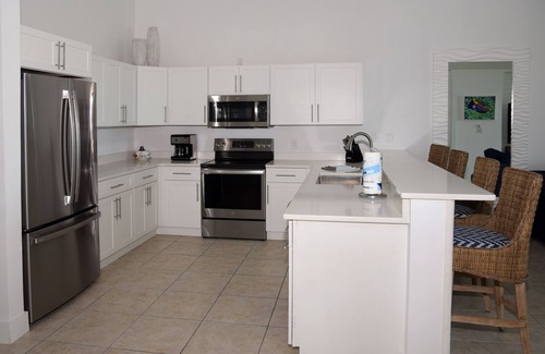 Treasure Cay Complejo | Kellie´s Cool Condo - Capacidad para 8 personas en la playa - ¡Séptima noche GRATIS!