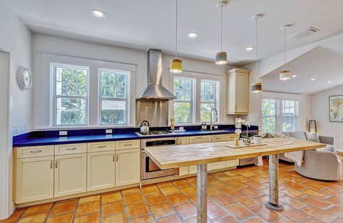 Northwood Shores Casa | Key West Estate in West Palm Beach with 2 separate homes & stunning pool oasis.