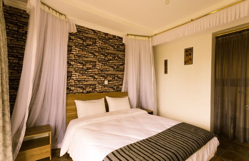 Kilimambogo Cama Y Desayuno | Habitación doble grande con baño Kilihouse B&b
