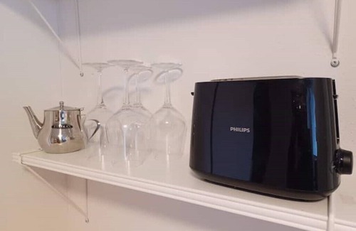 Steinhoefel Apartamento | Kleine Galerie: Küche Kamin Netflix Hofladen
