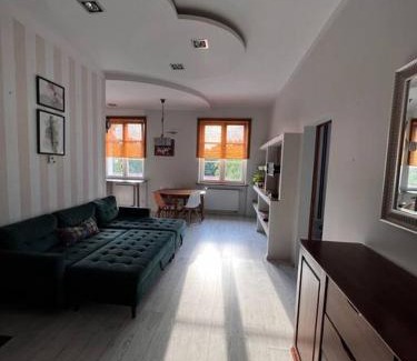 Biskupiec Apartamento | Klimatyczne mieszkanie w krainie jezior