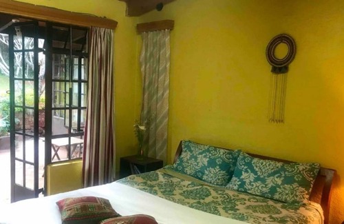Langata Cabaña | Koi Rustic Cottage