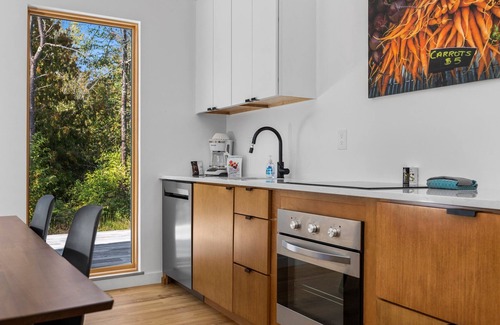 Acme Casa | KOTI 6 (Two Bedroom) Traverse City's Scandinavian Cabins, vacation home on TART & mins to Traverse C