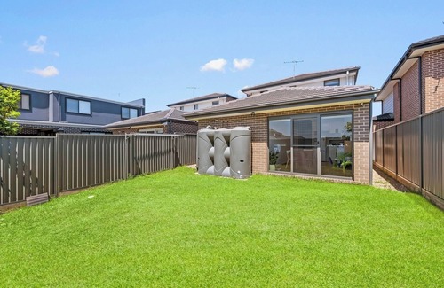 Austral Casa | KozyGuru | Austral | Charming 4Bedroom Family Home