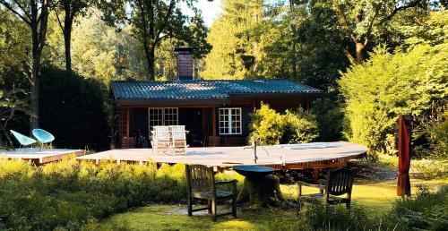 Bielenberg Casa | kuscheliges Waldhaus Kaminknistern