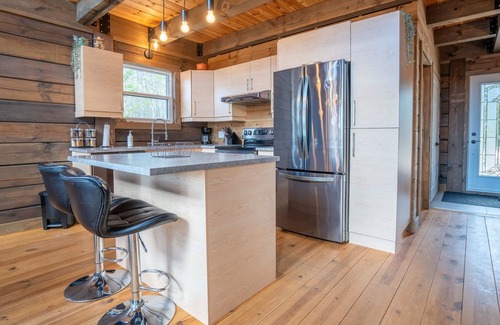 Mauricie Casa | L'Inukshuk - Chalet en bois ave Spa